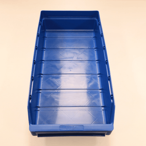 A RackZone Standard Shelf Bin ST5024 blue sits on a light-colored surface.