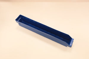 A blue RackZone ST6009 shelf bin sits on a light-colored surface.
