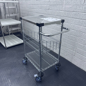 RackZone 3-tier stainless steel/chrome trolley on a black floor.