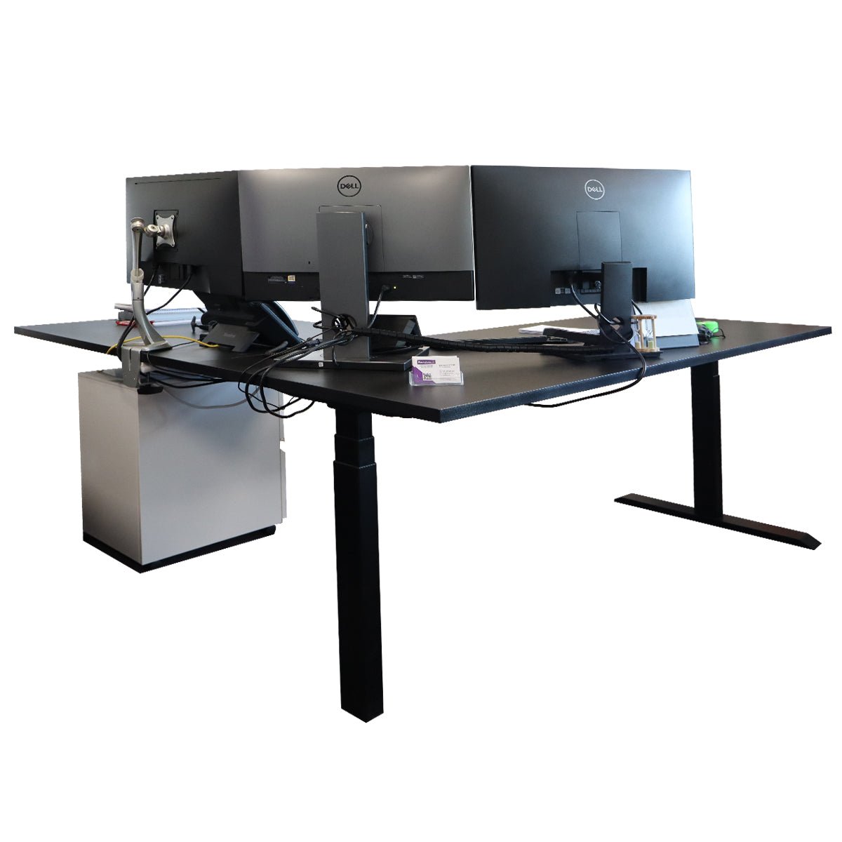 Dual workstation on RackZone L-Shaped Sit-Stand Desk with electric height adjustment.