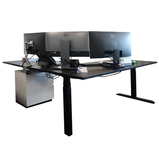 Dual workstation on RackZone L-Shaped Sit-Stand Desk with electric height adjustment.