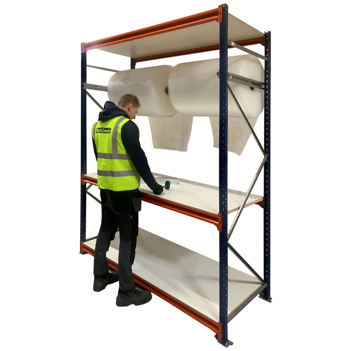Person at RackZone Packing Station 1850w with large rolls of packing material.