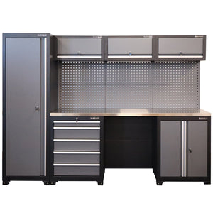 Garage storage system with cabinets, drawers, and a workbench.