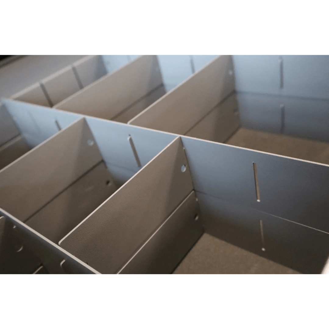 RackZone Modular Workstation Drawer Dividers create a grid in medium drawers.