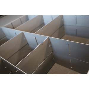 RackZone Modular Workstation Drawer Dividers create a grid in medium drawers.