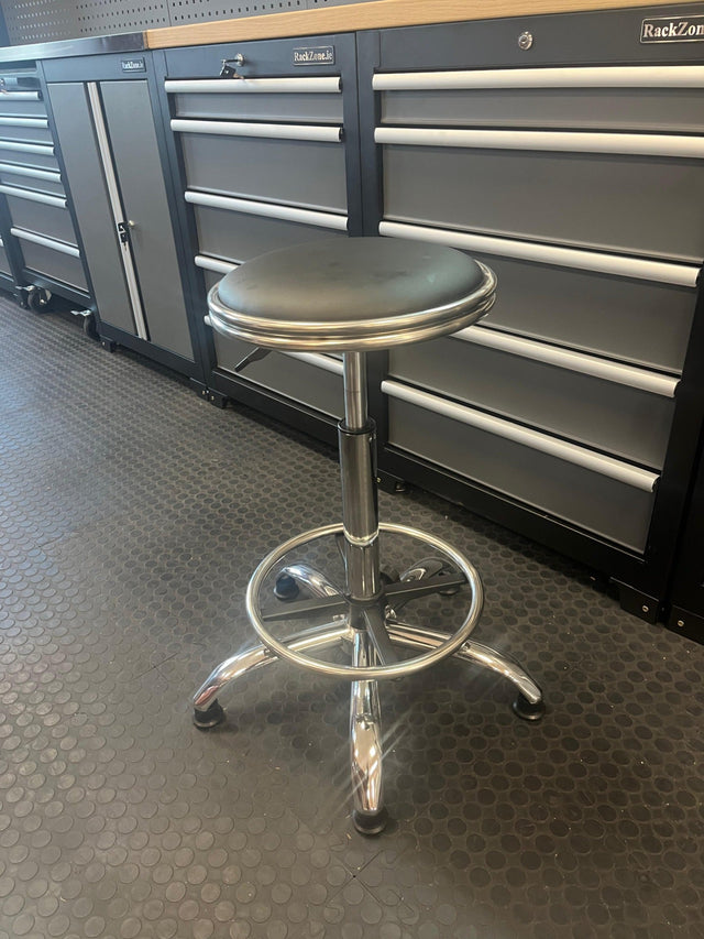 RackZone Modular Workstation Adjustable Stool with round seat on rubber floor.